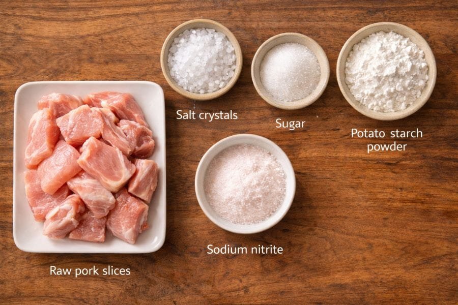 Ingredients in Spam that can be harmful to cats: pork, salt, sugar, sodium nitrite, potato starch